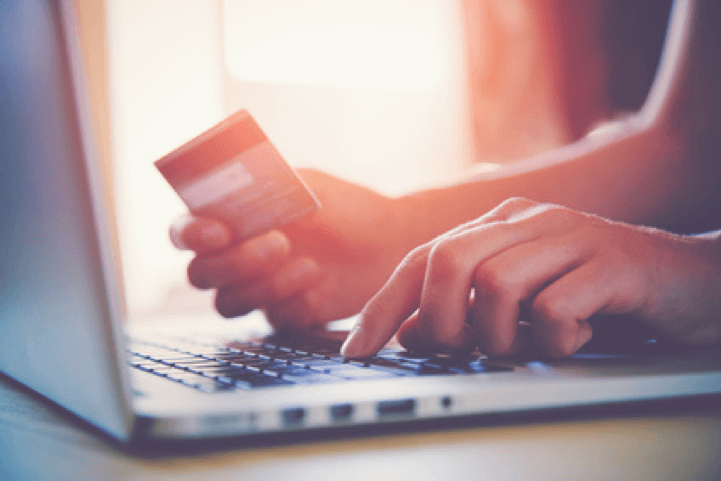 Hands holding credit card and using laptop. Online Shopping © Ivan Kruk